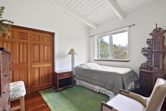 bedroom with lofted ceiling with beams, wooden ceiling, and dark hardwood / wood-style floors