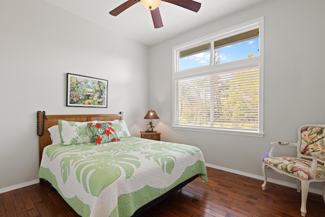 bedroom featuring dark hardwood / wood-style floors and ceiling fan