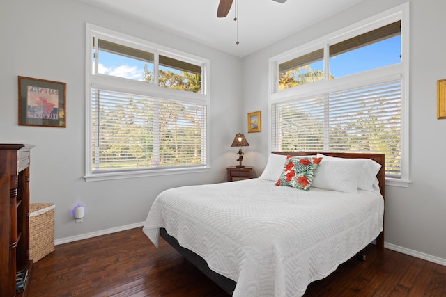 bedroom featuring ceiling fan and dark hardwood / wood-style floors