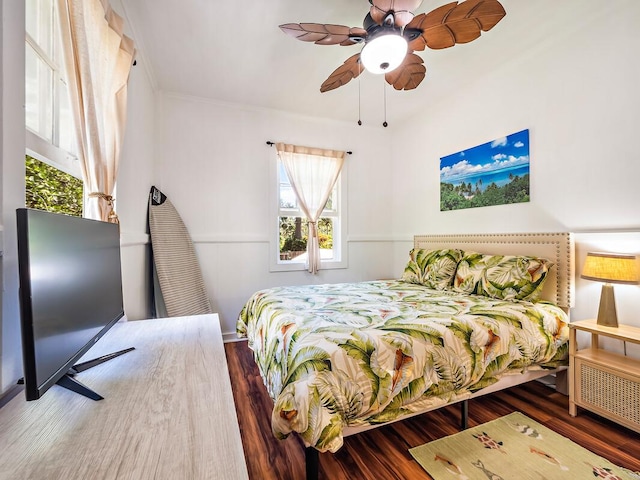 bedroom with dark wood-type flooring and ceiling fan