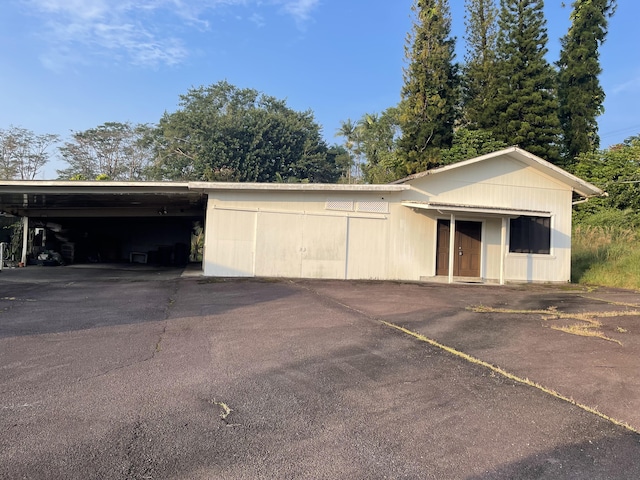 garage with a carport