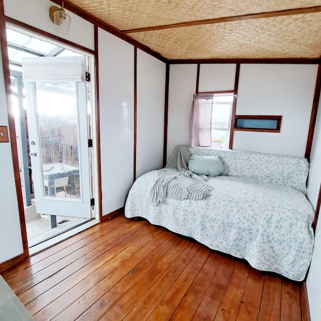 bedroom featuring light wood-type flooring and a closet