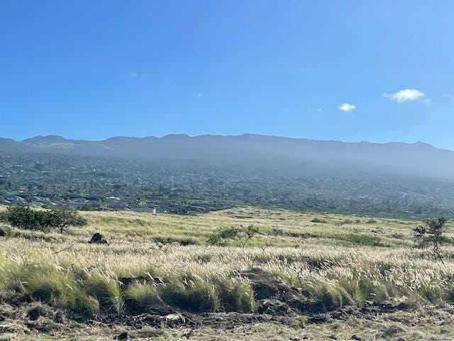 view of mountain feature with a rural view