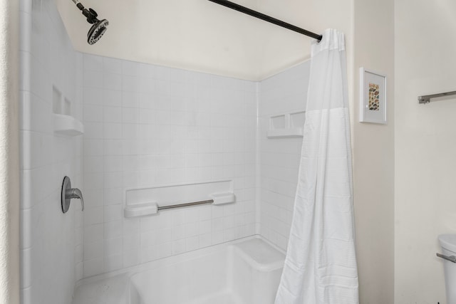 bathroom featuring walk in shower