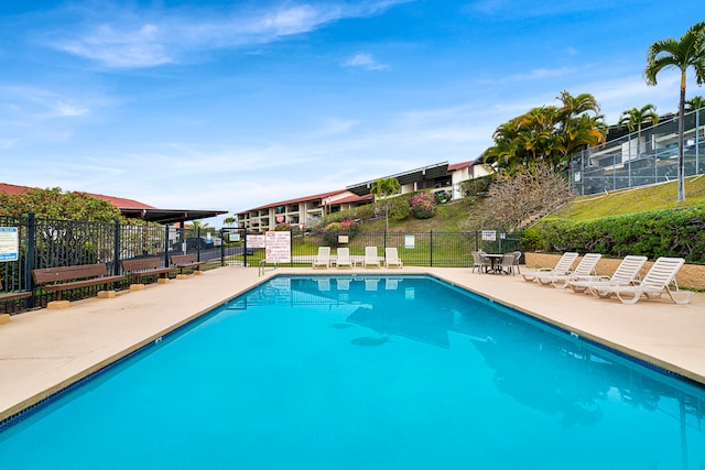 view of swimming pool featuring a patio