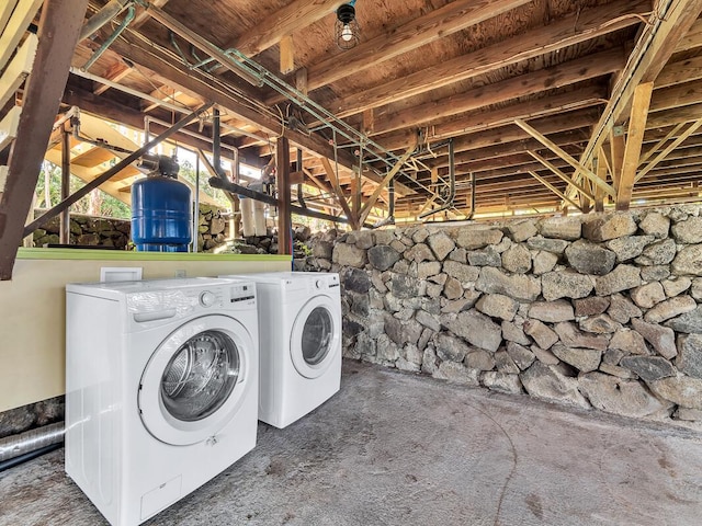 laundry room featuring laundry area and washing machine and clothes dryer