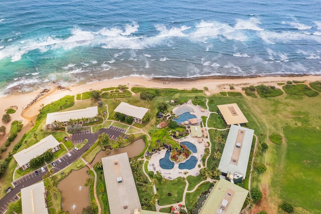 bird's eye view with a view of the beach and a water view