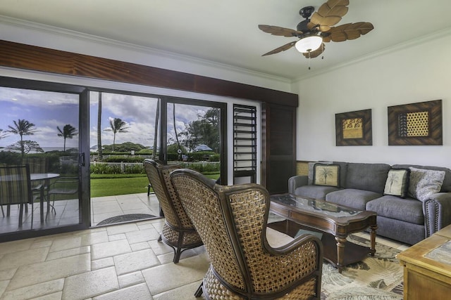 living room featuring ornamental molding and ceiling fan