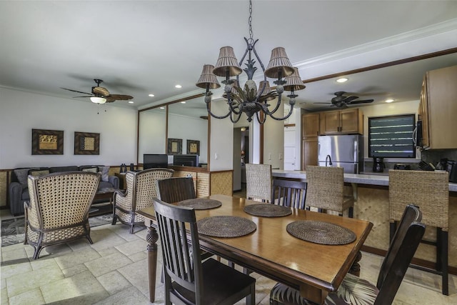 dining area with ornamental molding and ceiling fan with notable chandelier