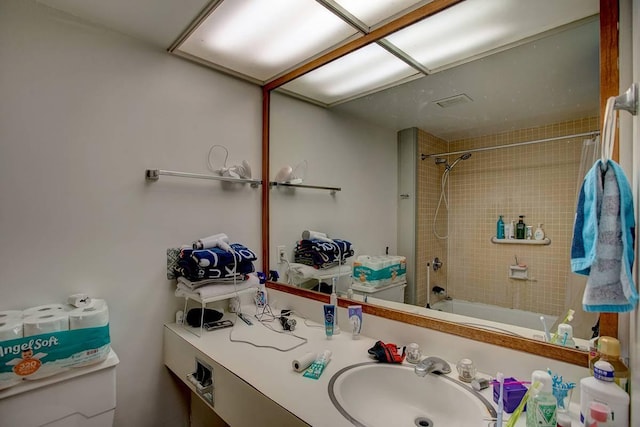 bathroom featuring sink and shower / bath combo with shower curtain