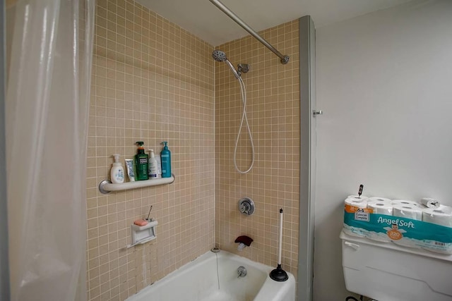 bathroom with shower / tub combo