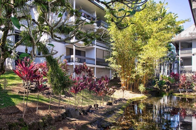 view of building exterior featuring a water view