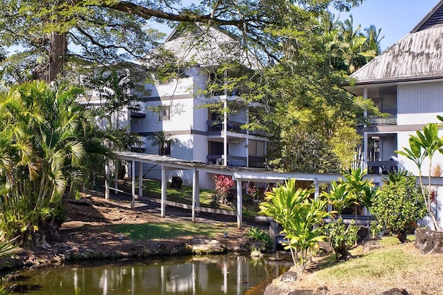 exterior space with a water view