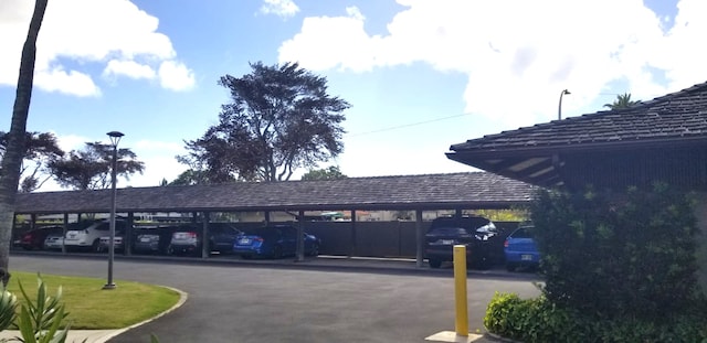 view of car parking with a carport