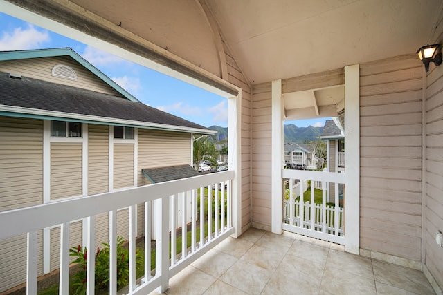 balcony featuring a mountain view