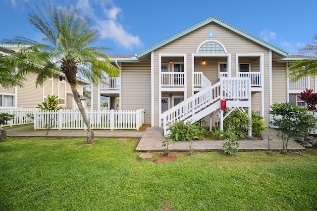 exterior space featuring a yard and covered porch