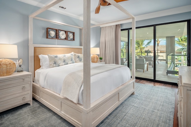 bedroom featuring hardwood / wood-style flooring, ceiling fan, and access to exterior