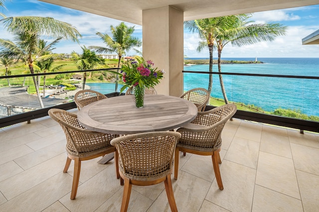 balcony featuring a water view