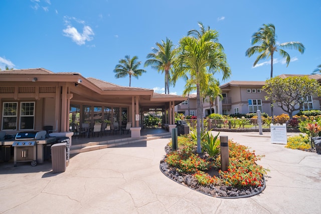 surrounding community with a patio