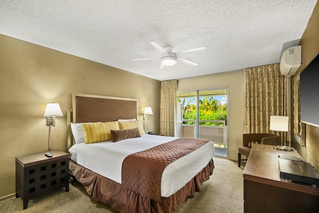 carpeted bedroom with a textured ceiling, access to outside, an AC wall unit, and ceiling fan