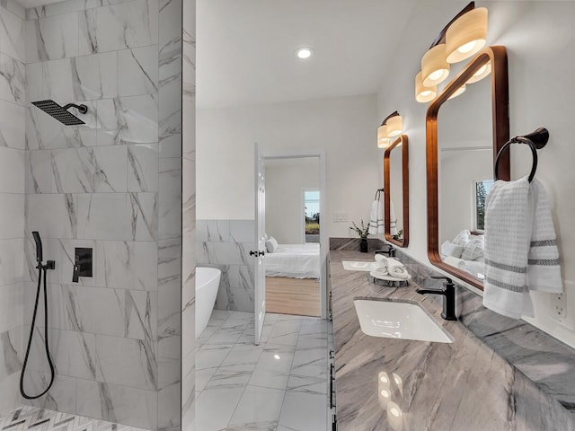 bathroom featuring vanity, plus walk in shower, and tile walls