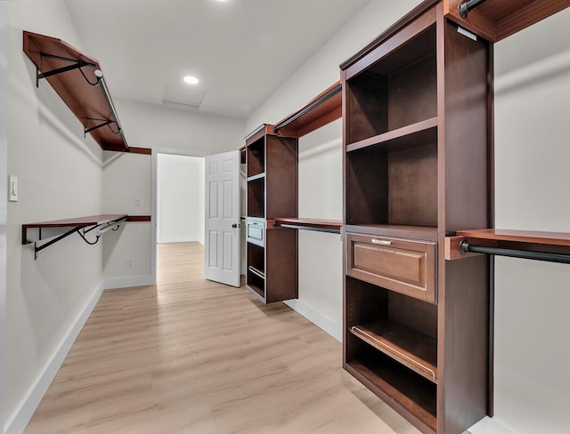 spacious closet with light wood-type flooring