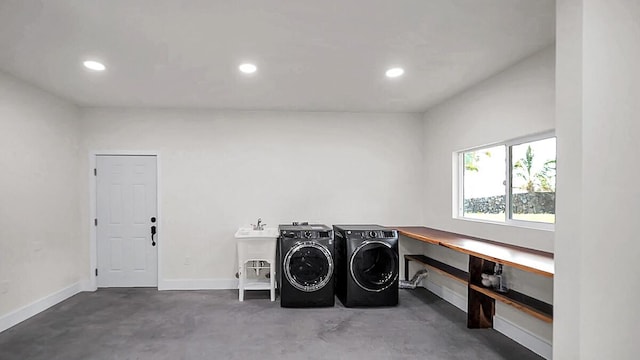 laundry room featuring washing machine and dryer