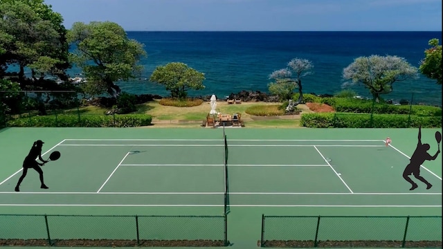 view of sport court with a water view and fence