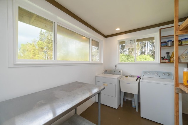 washroom with washer and dryer