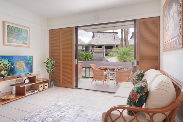 living area with light tile patterned flooring