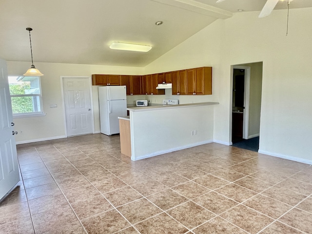 kitchen with beamed ceiling, hanging light fixtures, white fridge, and light tile patterned floors