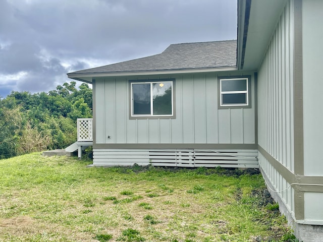 view of home's exterior featuring a yard