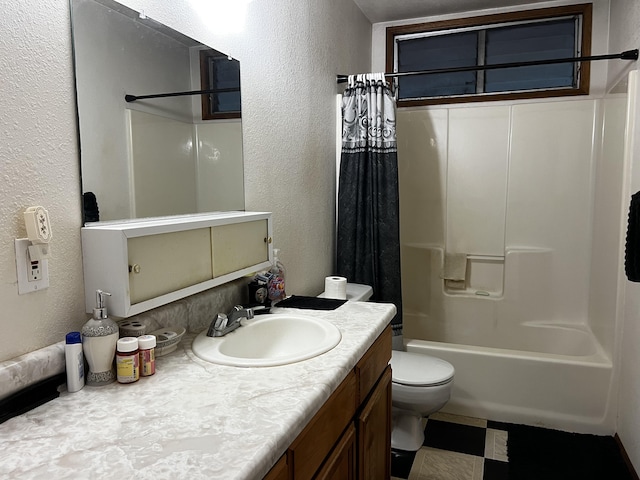 full bathroom with vanity, shower / bath combo with shower curtain, and toilet