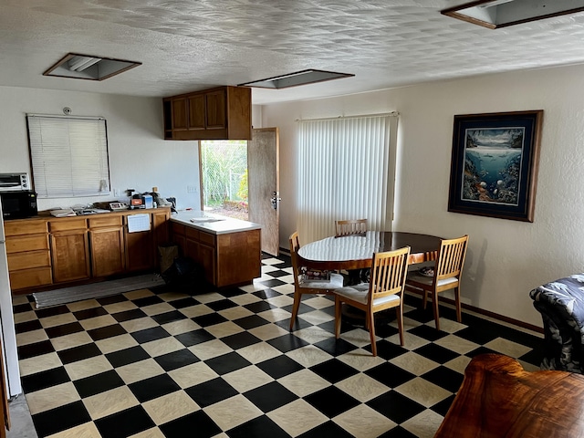 kitchen with a textured ceiling