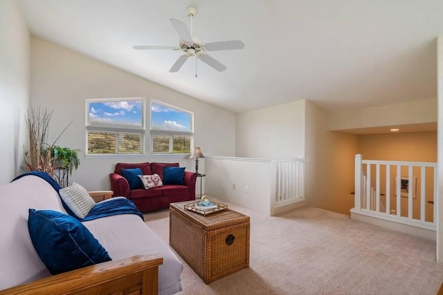 living room featuring light colored carpet and ceiling fan