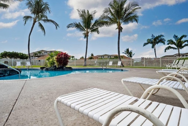 view of swimming pool with a patio area