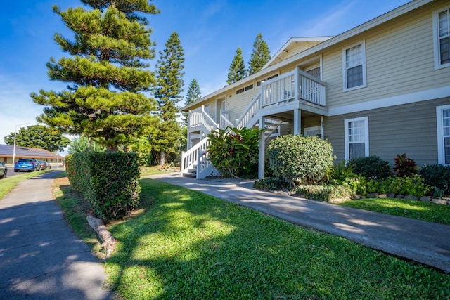 view of property exterior featuring a yard