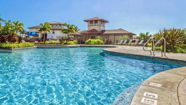 view of pool featuring a patio area