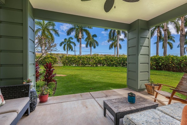 view of patio / terrace featuring ceiling fan