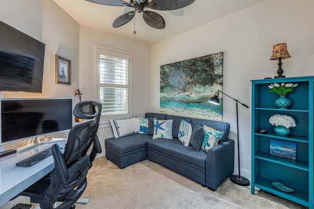 office space featuring light colored carpet and ceiling fan