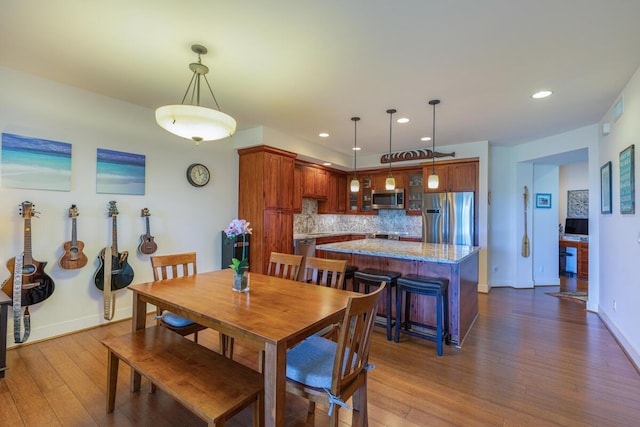 dining room featuring hardwood / wood-style flooring