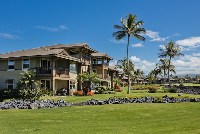 view of community featuring a yard