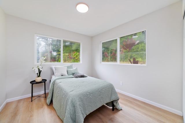 bedroom featuring light wood-type flooring