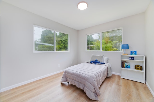 bedroom featuring light hardwood / wood-style floors