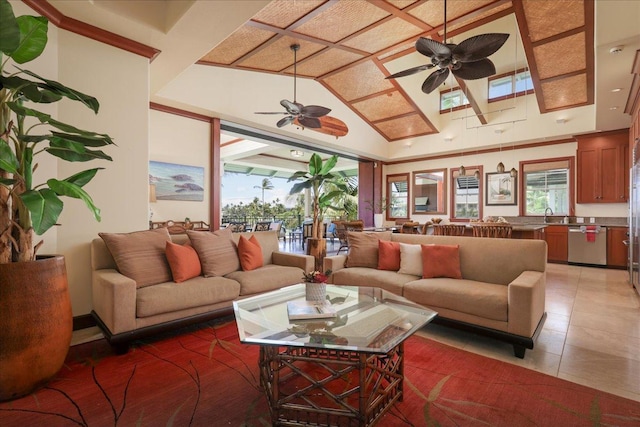 tiled living room with lofted ceiling, sink, and ceiling fan