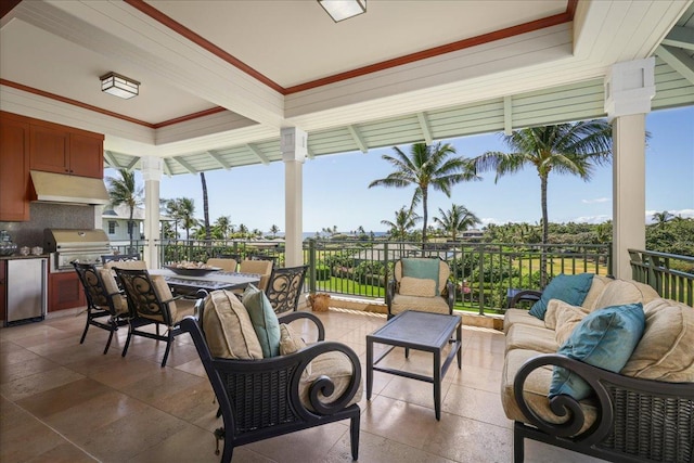 view of patio / terrace with grilling area, outdoor lounge area, and an outdoor kitchen