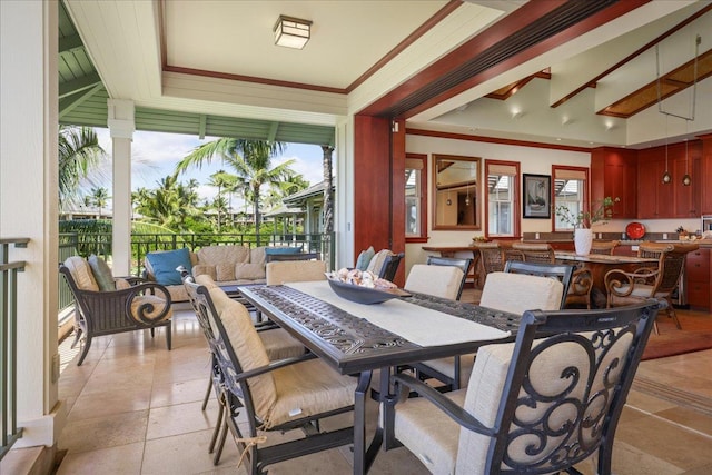 dining space featuring ornamental molding