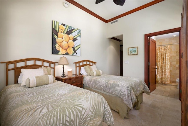 bedroom with ornamental molding and ceiling fan