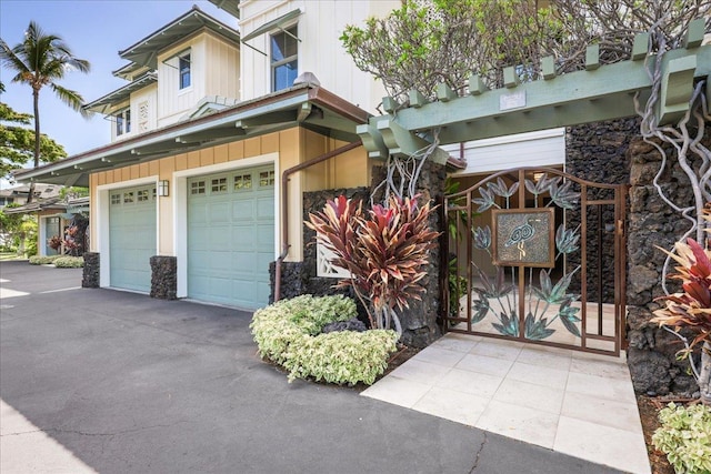 view of side of property featuring a garage