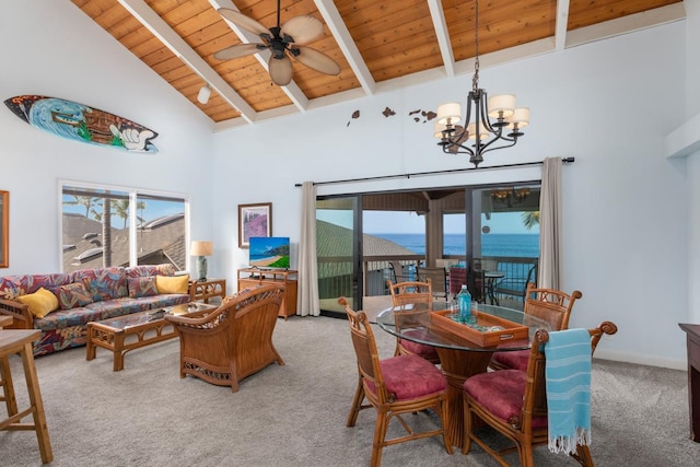 interior space featuring wood ceiling, carpet, beam ceiling, and plenty of natural light